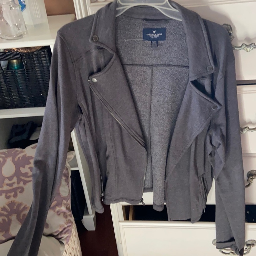 Grey blazer with zip up and pockets